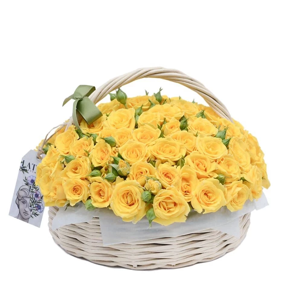 Yellow roses Hestia  in a basket